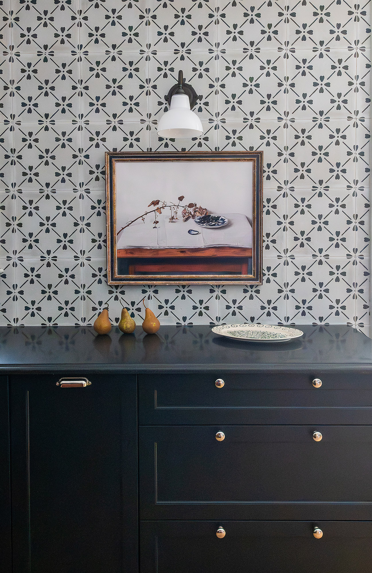 Kitchen cabinet elevation still life painting bronze sconce pears floral cement tile black shaker drawers brass hardware — Bronwyn Poole Interiors Kitchen cabinet elevation still life painting bronze sconce pears floral cement tile black shaker drawers brass hardware — Bronwyn Poole Interiors