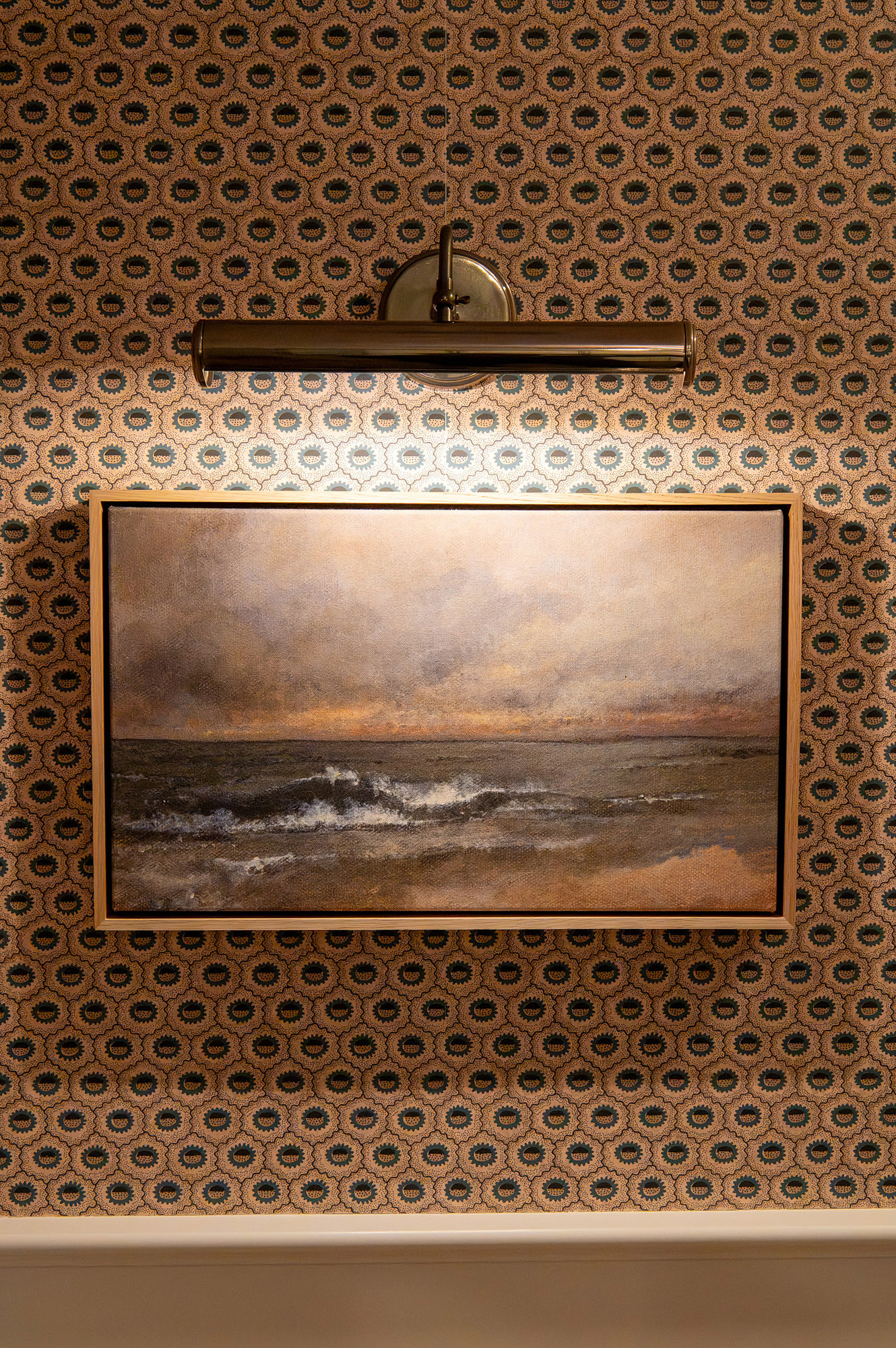 Primary bathroom detail terracotta geometric wallpaper bronze picture light seascape painting — Bronwyn Poole Interiors