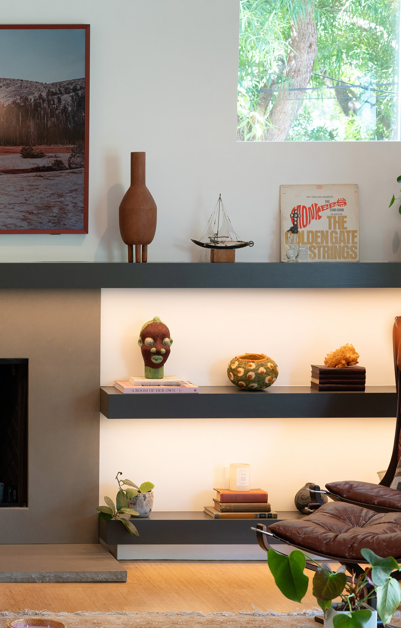 Santa monica fireplace wall floating shelves art sculpture vinyl records eames chair detail — Bronwyn Poole Interiors Santa monica fireplace wall floating shelves art sculpture vinyl records eames chair detail — Bronwyn Poole Interiors