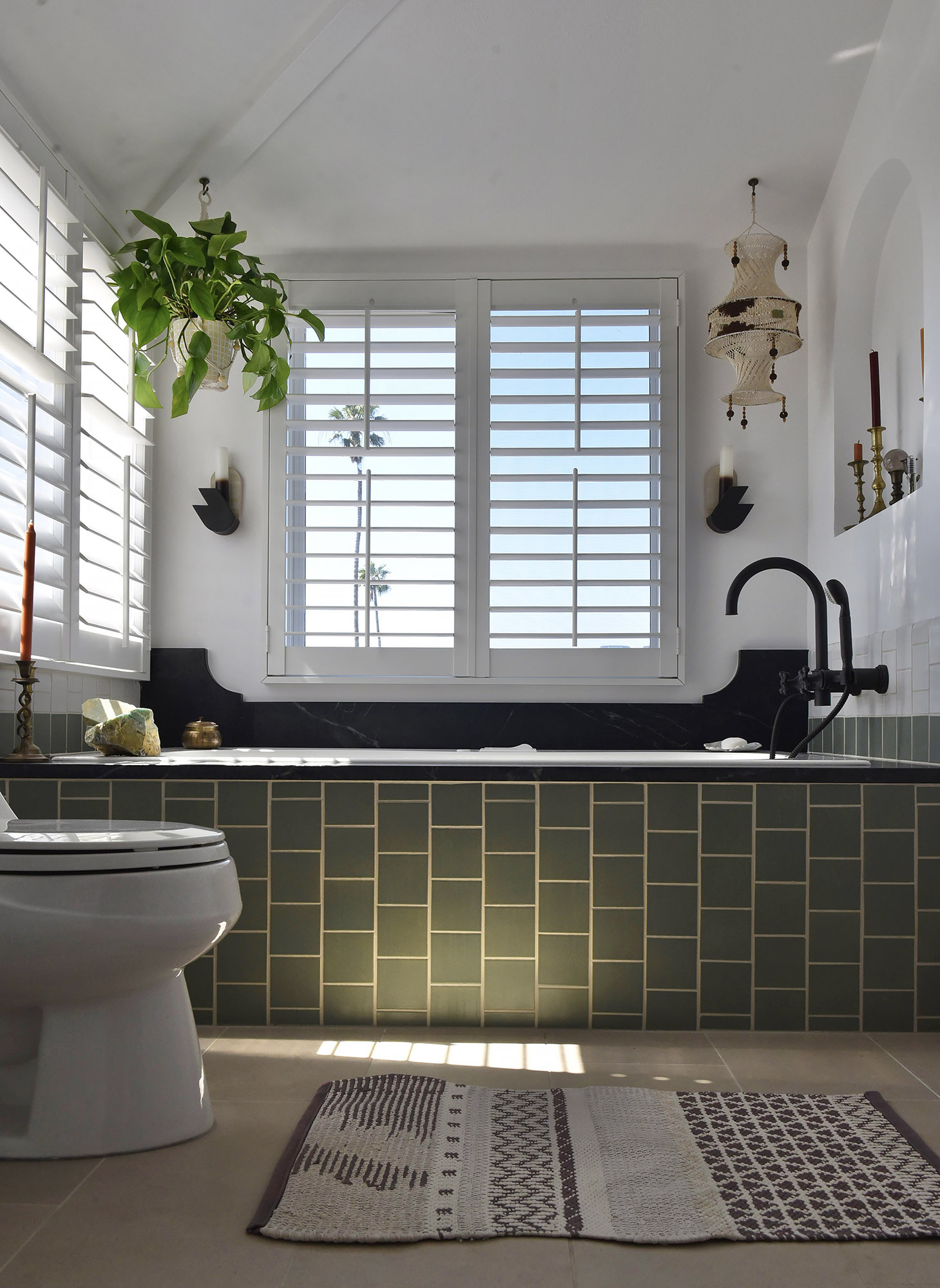 Santa monica green tile bathtub wide plantation shutters hanging plant macrame black faucet — Bronwyn Poole Interiors Santa monica green tile bathtub wide plantation shutters hanging plant macrame black faucet — Bronwyn Poole Interiors