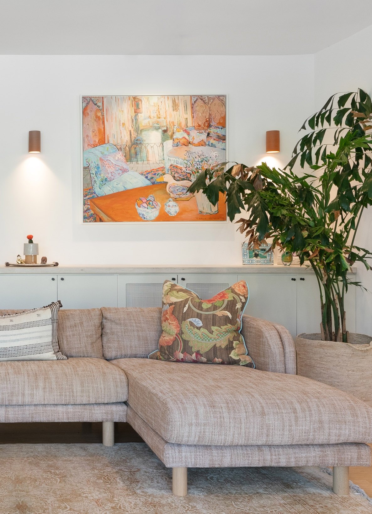 Santa monica living room colorful painting copper sconces sectional sofa floral cushion detail — Bronwyn Poole Interiors Santa monica living room colorful painting copper sconces sectional sofa floral cushion detail — Bronwyn Poole Interiors