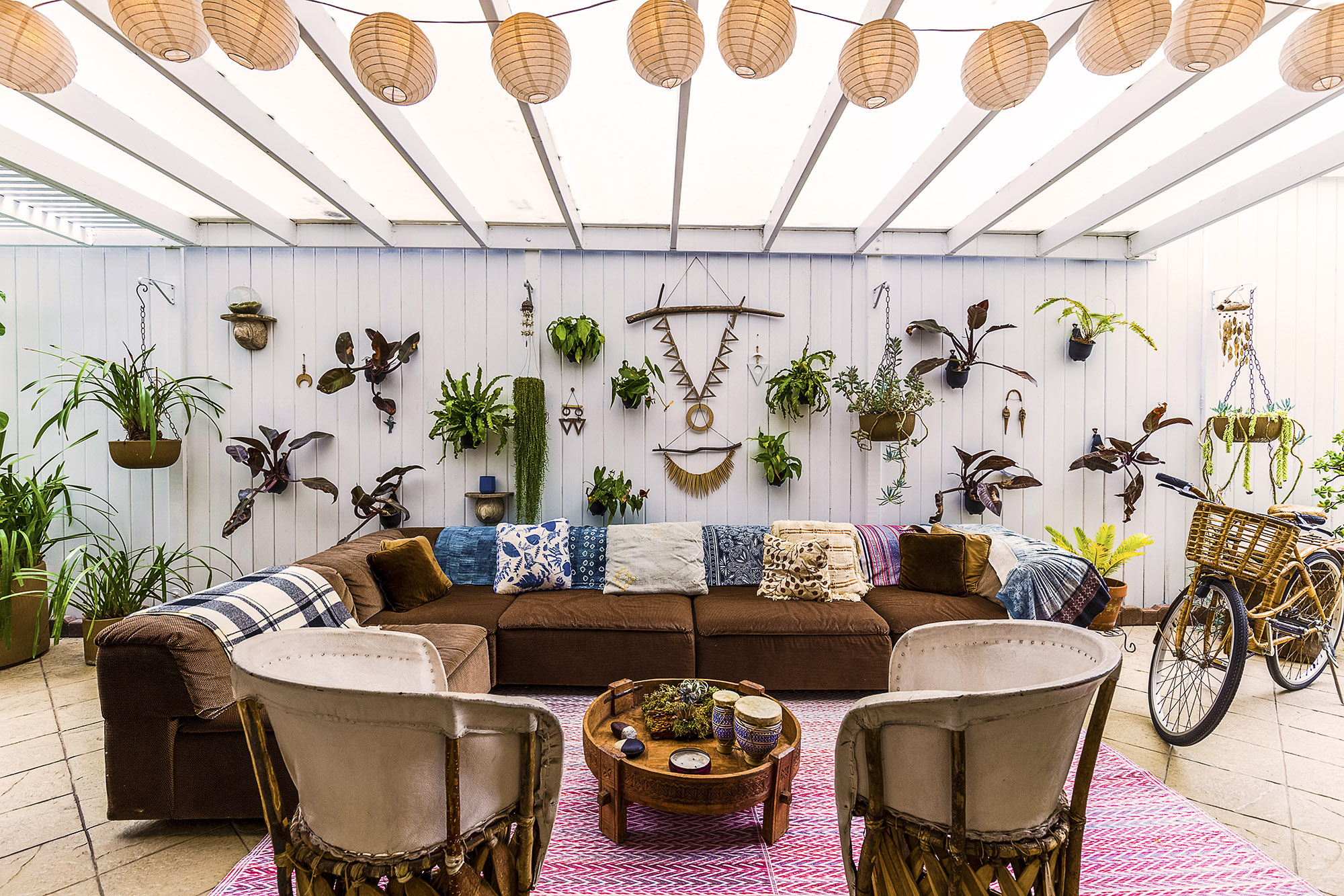 Bronwyn Poole Interiors Santa Monica Outdoor Lounge Plant Wall Lanterns Boho Sectional Bicycle — Interior Design by Bronwyn Poole