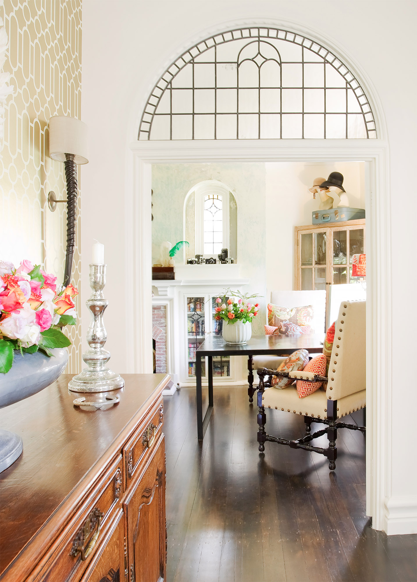 Spruson heritage entry to lounge arched fanlight antique sideboard fireplace view detail — Spruson Street — Bronwyn Poole Interiors Spruson heritage entry to lounge arched fanlight antique sideboard fireplace view detail — Spruson Street — Bronwyn Poole Interiors