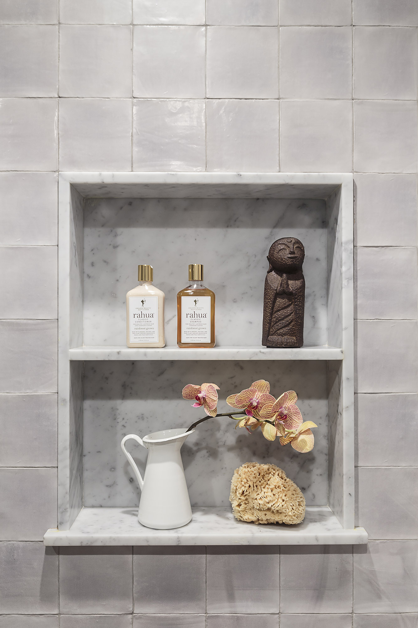 Ensuite marble shower niche orchid sculpture sea sponge zellige tile — Bronwyn Poole Interiors