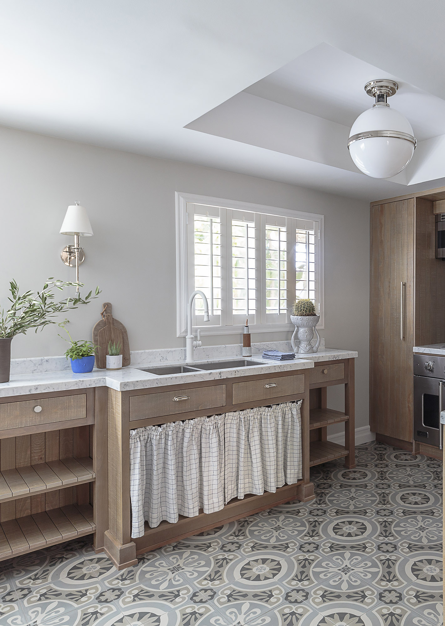 Kitchen cerused oak island wide marble counter skylight encaustic floor curtain sink — Bronwyn Poole Interiors