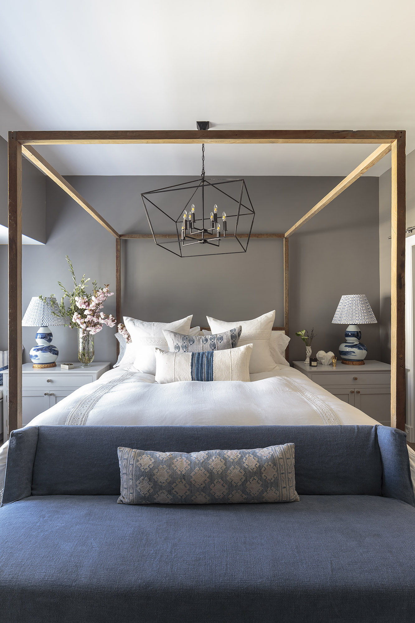 Primary bedroom canopy bed geometric chandelier navy daybed white bedding — Bronwyn Poole Interiors Primary bedroom canopy bed geometric chandelier navy daybed white bedding — Bronwyn Poole Interiors
