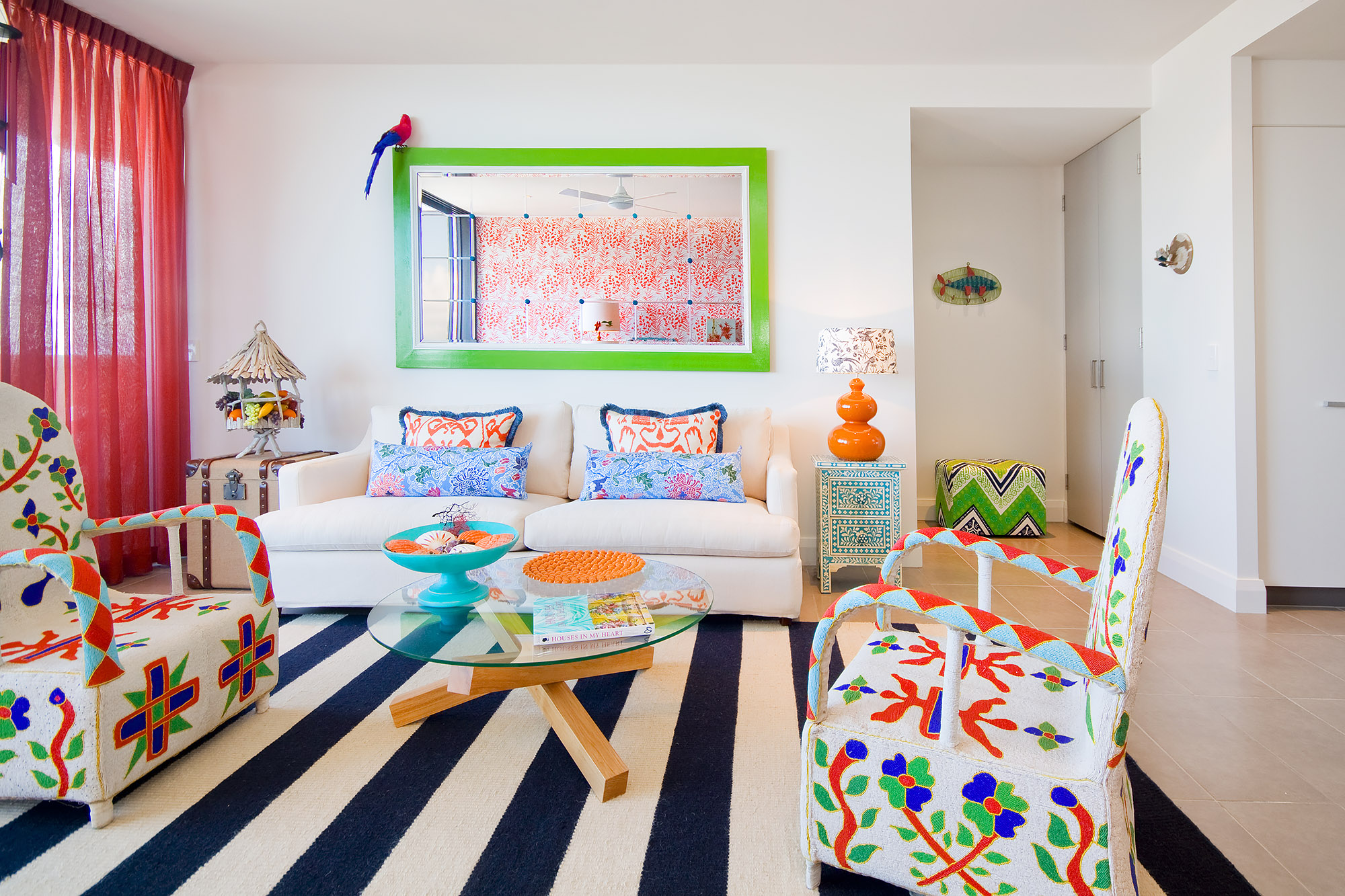 Bronwyn Poole Interiors Archive Tropical Living Suzani Chairs Striped Rug Green Mirror Parrot Sconce — Interior Design by Bronwyn Poole
