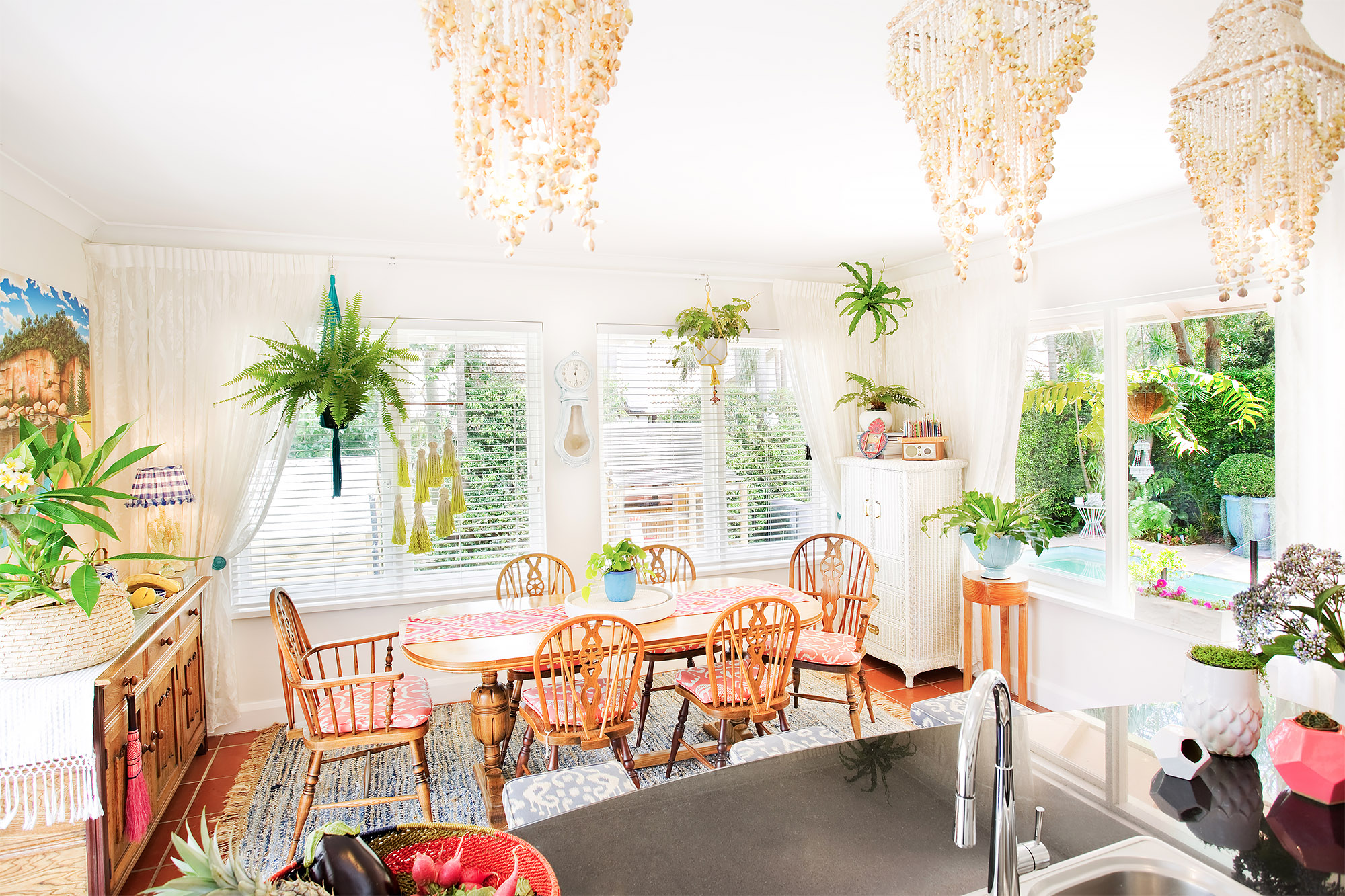 Bronwyn Poole Interiors Bohemian Dining Room Shell Chandeliers Windsor Chairs Terracotta Tiles Hanging Ferns Garden View — Interior Design by Bronwyn Poole