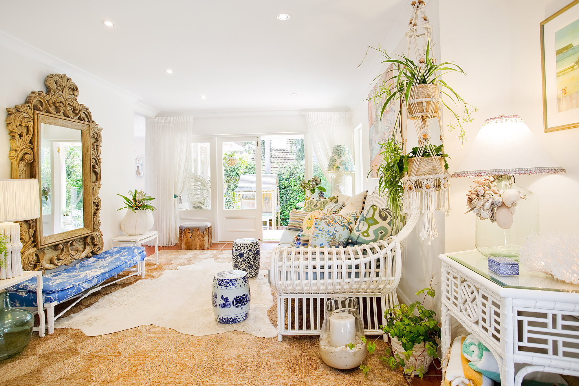 Bronwyn Poole Interiors Bohemian Living Rattan Armchair Gilt Mirror Macrame Garden View — Interior Design by Bronwyn Poole