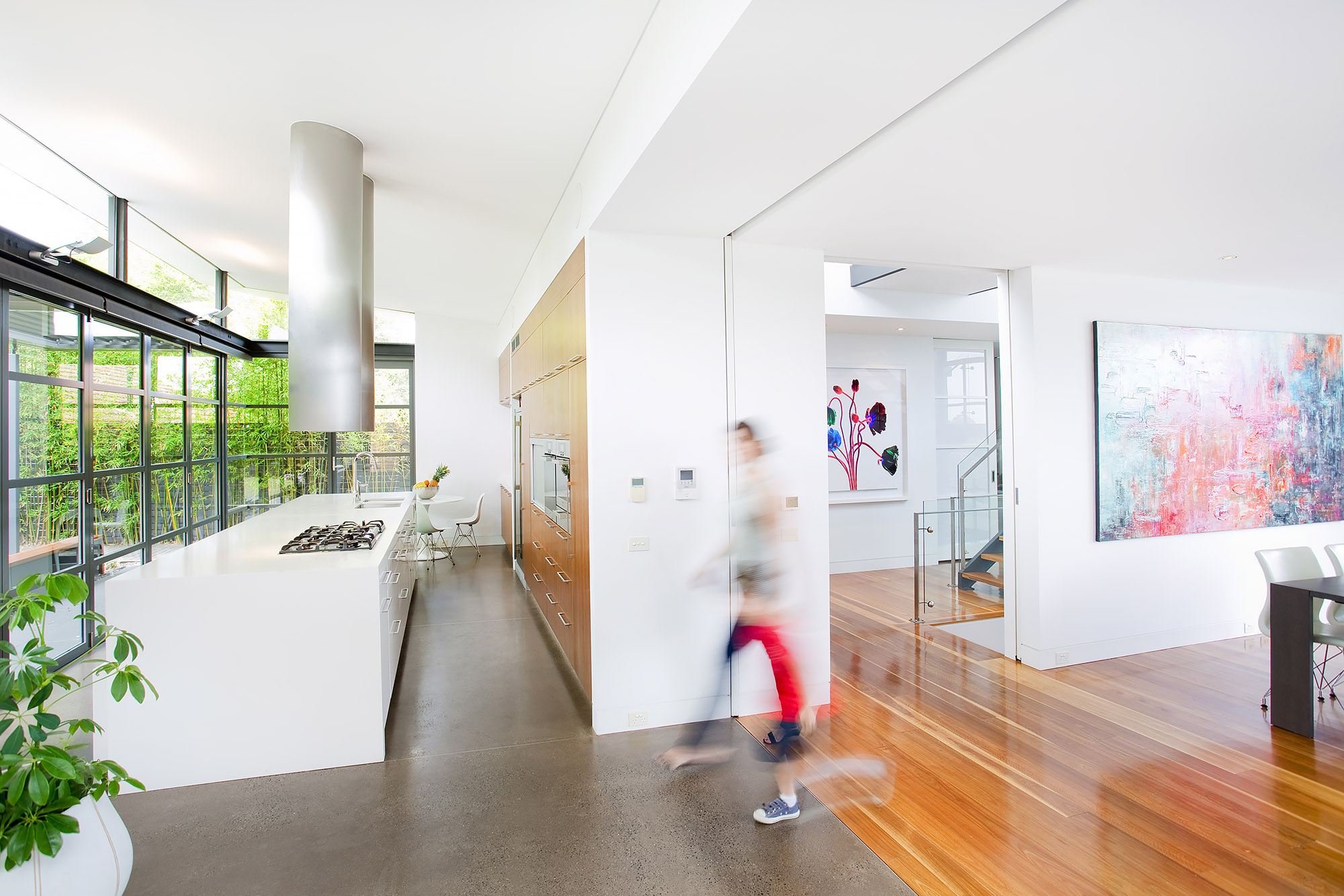 Bronwyn Poole Interiors Modern Open Plan Kitchen White Island Timber Cabinets Polished Concrete Abstract Art — Interior Design by Bronwyn Poole