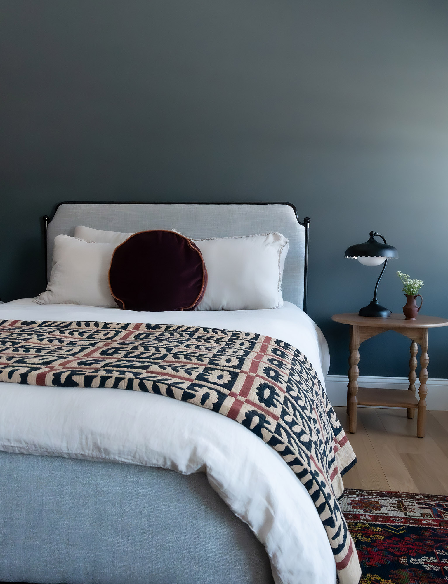 Bronwyn Poole Interiors Teal Bedroom Iron Bed Patterned Throw Bobbin Nightstand Scallop Lamp Persian Rug — Interior Design by Bronwyn Poole
