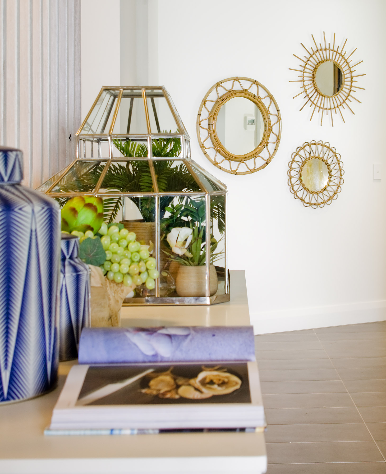 Bronwyn Poole Interiors Travelers Sanctuary Rattan Mirrors Glass Cloche Decor — Interior Design by Bronwyn Poole