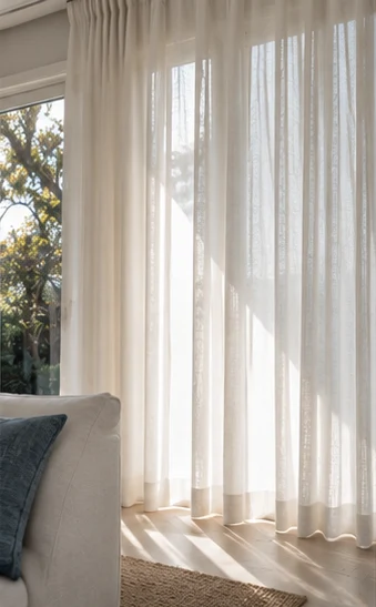 Design inspiration: soft daylight filtered through full-height sheer curtains